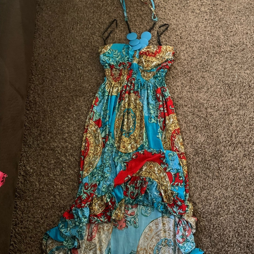 Halter top dress short in the front long in the back. Size large